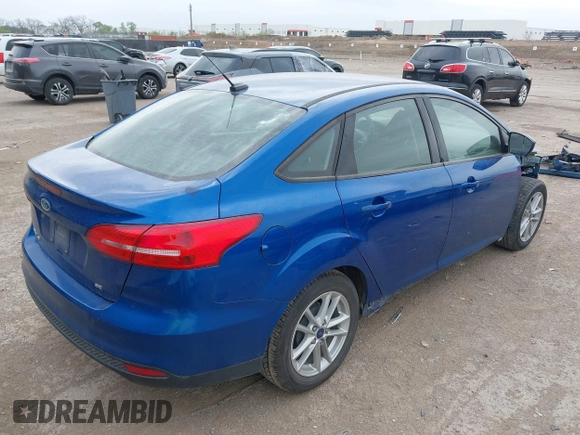 2018 Ford Focus SE with VIN 1FADP3F23JL210539, listed as a IAAI auction lot 41921226 with 100,609 mi miles. Bid and sale history available at carsss.com. Image 4.
