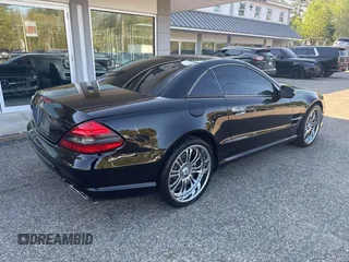 2009 Mercedes-Benz SL 550 z VIN WDBSK71F69F148290, wystawiony jako IAAI lot #42238570 z przebiegiem 161 833 mil mil oraz . Historia ofert i sprzedaży dostępna na DreamBid. Obrazek 4.
