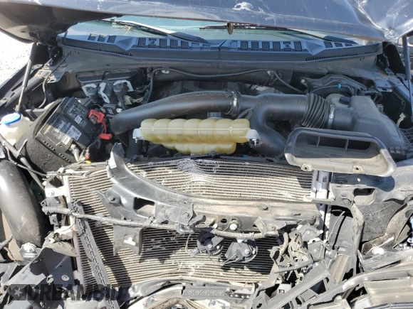 2020 Ford F-150 XL z VIN 1FTEW1E42LFB68620, wystawiony jako Copart lot #60610545 z przebiegiem 79 866 mil mil oraz Szkoda całkowita • Salvage title. Historia ofert i sprzedaży dostępna na DreamBid. Obrazek 11.