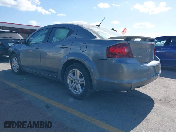 2013 Dodge Avenger SXT with VIN 1C3CDZCG5DN544909, listed as a IAAI auction lot 42274681 with 136,781 mi miles and . Bid and sale history available at DreamBid. Image 3.