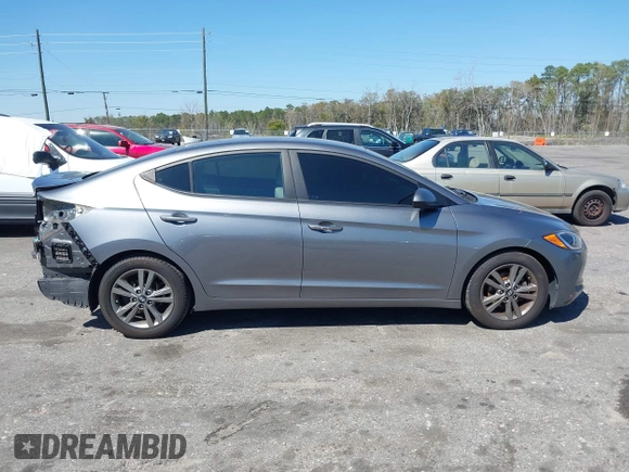 2018 Hyundai Elantra SEL z VIN 5NPD84LF5JH336295, wystawiony jako IAAI lot #41786963 z przebiegiem 96 399 mil mil oraz . Historia ofert i sprzedaży dostępna na DreamBid. Obrazek 13.