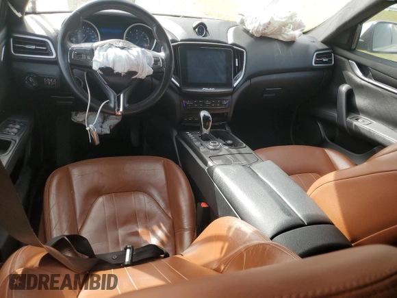 2017 Maserati Ghibli with VIN ZAM57XSA6H1233933, listed as a Copart auction lot 49089525 with 76,965 mi miles and Salvage Title. Bid and sale history available at carsss.com. Image 8.