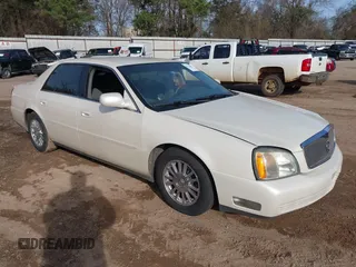 2003 Cadillac DeVille DHS z VIN 1G6KE54YX3U189473, wystawiony jako IAAI lot #41734202 z przebiegiem 127 813 mil mil oraz . Historia ofert i sprzedaży dostępna na DreamBid. Obrazek 1.