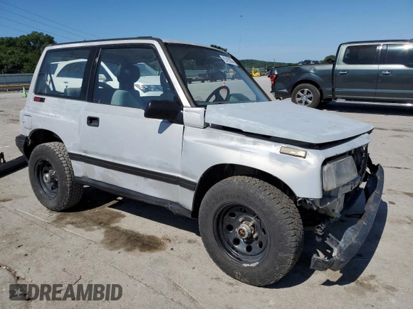 1991 Geo Tracker z VIN 2CNBJ18U3M6909006, wystawiony jako Copart lot #73638944 z przebiegiem 65 033 mil mil oraz Tytuł czysty. Historia ofert i sprzedaży dostępna na DreamBid. Obrazek 4.