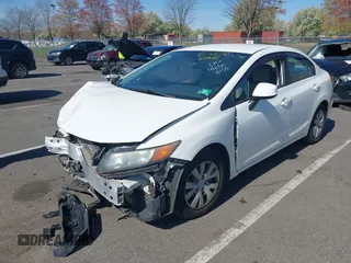 2012 Honda Civic LX with VIN 19XFB2F54CE348155, listed as a IAAI auction lot 42064540 with 238,636 mi miles and . Bid and sale history available at DreamBid. Image 17.
