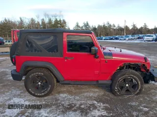 2014 Jeep Wrangler Sport with VIN 1C4AJWAG9EL295931, listed as a IAAI auction lot 41362815 with 104,881 mi miles and . Bid and sale history available at carsss.com. Image 13.