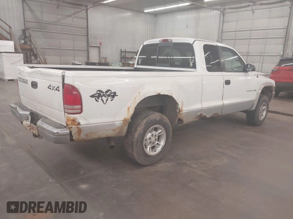 1999 Dodge Dakota SLT with VIN 1B7GG22XXXS254782, listed as a IAAI auction lot 41847644 with 164,607 mi miles and . Bid and sale history available at carsss.com. Image 4.
