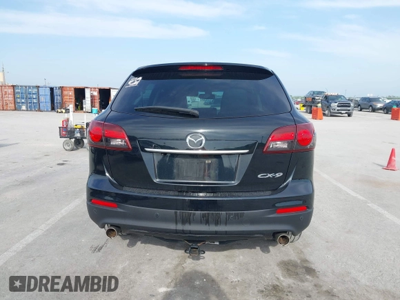2015 Mazda CX-9 Grand Touring z VIN JM3TB2DA1F0456773, wystawiony jako IAAI lot #42257555 z przebiegiem 152 890 mil mil oraz . Historia ofert i sprzedaży dostępna na DreamBid. Obrazek 16.
