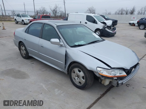 2001 Honda Accord EX z VIN 1HGCG16571A078287, wystawiony jako IAAI lot #41397391 z przebiegiem 238 239 mil mil oraz . Historia ofert i sprzedaży dostępna na DreamBid. Obrazek 1.