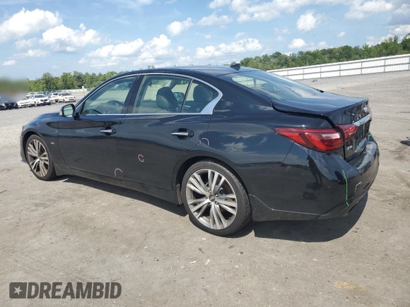 2018 Infiniti Q50 Luxe with VIN JN1EV7AR9JM436131, listed as a Copart auction lot 61730475 with 121,452 mi miles and Salvage title. Bid and sale history available at DreamBid. Image 2.