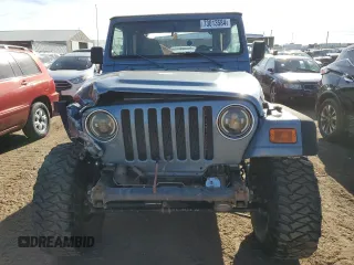 1998 Jeep Wrangler Sport with VIN 1J4FY19S2WP719595, listed as a Copart auction lot 73013584 with 190,056 mi miles and Salvage Title. Bid and sale history available at carsss.com. Image 5.
