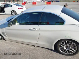 2015 BMW 4 Series 428i xDrive with VIN WBA3T1C51FP821140, listed as a IAAI auction lot 41802697 with 95,232 mi miles and . Bid and sale history available at carsss.com. Image 14.