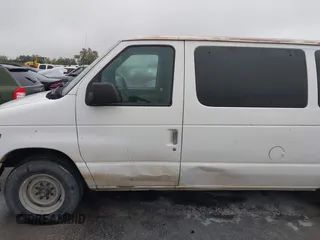 1998 Ford Econoline Wagon XL z VIN 1FBSS31L4WHB74004, wystawiony jako IAAI lot #41912360 z przebiegiem 458 615 mil mil oraz . Historia ofert i sprzedaży dostępna na DreamBid. Obrazek 6.