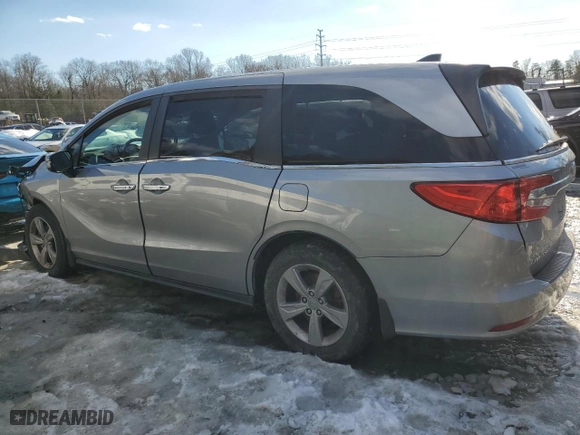 2019 Honda Odyssey EX-L with VIN 5FNRL6H75KB017819, listed as a Copart auction lot 87477044 with 81,061 mi miles and Salvage Title. Bid and sale history available at carsss.com. Image 2.