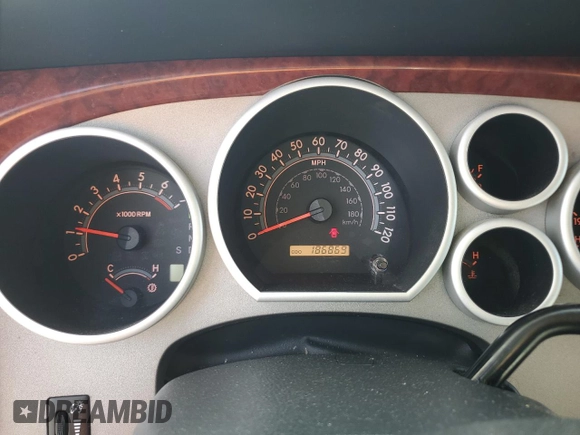2012 Toyota Tundra z VIN 5TFDW5F14CX216264, wystawiony jako Copart lot #60983285 z przebiegiem 186 869 mil mil oraz Szkoda całkowita • Salvage title. Historia ofert i sprzedaży dostępna na DreamBid. Obrazek 9.