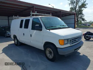 2006 Ford Econoline Cargo with VIN 1FTRE14W56DB43993, listed as a IAAI auction lot 41802551 with 214,098 mi miles. Bid and sale history available at carsss.com. Image 1.