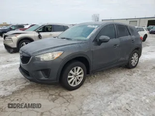 2015 Mazda CX-5 Sport with VIN JM3KE2BE2F0541436, listed as a Copart auction lot 87596785 with 197,310 mi miles and Salvage Title. Bid and sale history available at carsss.com. Image 1.