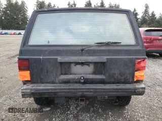 1988 Jeep Grand Cherokee z VIN 1JCMT7895JT247338, wystawiony jako Copart lot #83615234 z przebiegiem 185 676 mil mil oraz Szkoda całkowita • Salvage title. Historia ofert i sprzedaży dostępna na DreamBid. Obrazek 6.