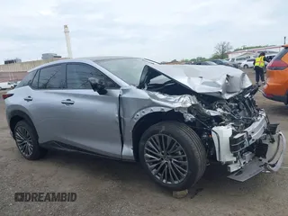 2024 Lexus RZ 450e Premium z VIN JTJAAAAB9RA025975, wystawiony jako IAAI lot #42122679 z przebiegiem Nie podano mil oraz . Historia ofert i sprzedaży dostępna na DreamBid. Obrazek 12.