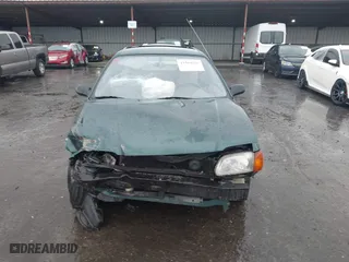 1996 Toyota Tercel DX with VIN JT2AC52L9T0127262, listed as a IAAI auction lot 41504210 with 135,732 mi miles. Bid and sale history available at carsss.com. Image 13.