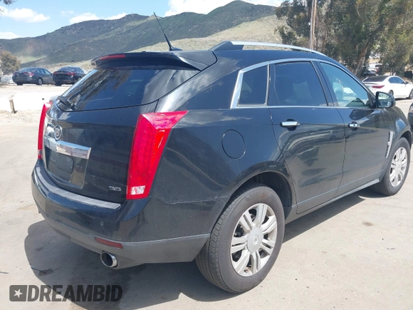 2012 Cadillac SRX Luxury Collection with VIN 3GYFNAE38CS635205, listed as a IAAI auction lot 41970482 with 220,593 mi miles and . Bid and sale history available at DreamBid. Image 4.