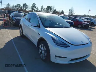 2023 Tesla Model Y Long Range with VIN 7SAYGDEE5PA094253, listed as a IAAI auction lot 41701966 with 29,458 mi miles and . Bid and sale history available at DreamBid. Image 1.