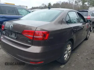 2015 Volkswagen Jetta Sedan 1.8T SE with VIN 3VWD17AJ2FM403107, listed as a IAAI auction lot 41849921 with 103,990 mi miles. Bid and sale history available at carsss.com. Image 4.