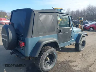 1997 Jeep Wrangler SE with VIN 1J4FY29P0VP522005, listed as a IAAI auction lot 41895863 with 196,614 mi miles. Bid and sale history available at carsss.com. Image 4.