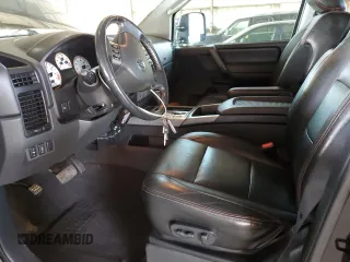 2011 Nissan Titan Pro-4X z VIN 1N6BA0EC9BN304469, wystawiony jako Copart lot #52982815 z przebiegiem 108 829 mil mil oraz Szkoda całkowita • Salvage title. Historia ofert i sprzedaży dostępna na DreamBid. Obrazek 7.