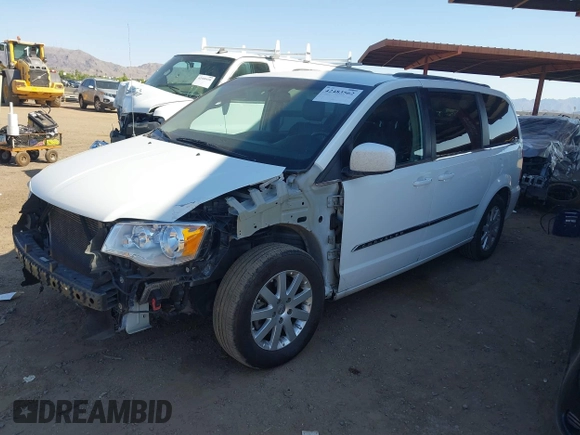 2014 Chrysler Town & Country Touring with VIN 2C4RC1BG8ER434940, listed as a IAAI auction lot 42483562 with 162,625 mi miles and . Bid and sale history available at DreamBid. Image 2.