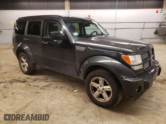 2011 Dodge Nitro SXT z VIN 1D4PT5GK1BW544942, wystawiony jako Copart lot #79857243 z przebiegiem 128 613 mil mil oraz Czysty tytuł • Clean title. Historia ofert i sprzedaży dostępna na DreamBid. Obrazek 4.