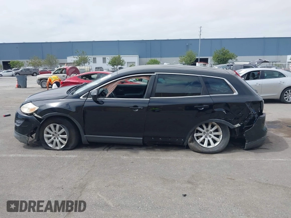 2010 Mazda CX-9 Grand Touring with VIN JM3TB2MV1A0203416, listed as a IAAI auction lot 42090500 with 131,659 mi miles and . Bid and sale history available at carsss.com. Image 14.