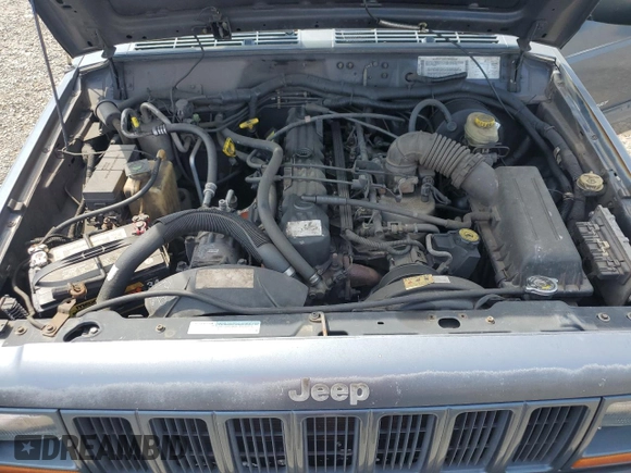 2001 Jeep Cherokee Sport with VIN 1J4FT48S31L596648, listed as a Copart auction lot 54101345 with 190,688 mi miles and Clean title. Bid and sale history available at DreamBid. Image 12.