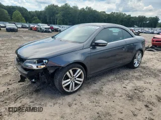 2012 Volkswagen Eos Executive with VIN WVWFW7AH5CV002727, listed as a Copart auction lot 62821635 with 112,225 mi miles and Clean title. Bid and sale history available at DreamBid. Image 1.