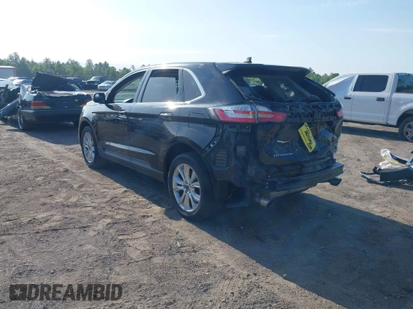 2022 Ford Edge Titanium with VIN 2FMPK4K99NBA45354, listed as a IAAI auction lot 42187761 with 75,458 mi miles and . Bid and sale history available at DreamBid. Image 3.