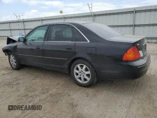 2000 Toyota Avalon XL with VIN 4T1BF28B4YU105732, listed as a Copart auction lot 54752665 with 143,855 mi miles and Salvage Title. Bid and sale history available at DreamBid. Image 2.