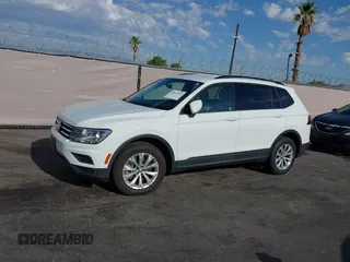 2020 Volkswagen Tiguan S with VIN 3VV1B7AXXLM036994, listed as a IAAI auction lot 42643035 with 62,676 mi miles and . Bid and sale history available at DreamBid. Image 14.