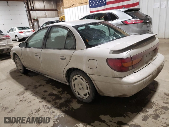 2000 Saturn SL with VIN 1G8ZK5273YZ239987, listed as a Copart auction lot 41577615 with 145,659 mi miles and Salvage title. Bid and sale history available at DreamBid. Image 2.