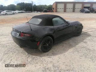 2021 Mazda MX-5 Miata Sport with VIN JM1NDAB73M0454064, listed as a IAAI auction lot 42613537 with 24,630 mi miles and . Bid and sale history available at DreamBid. Image 4.