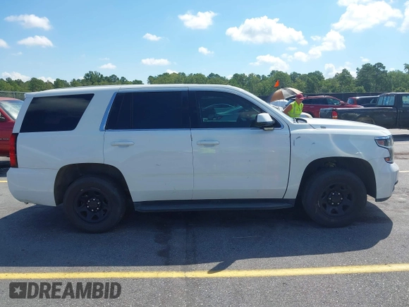 2018 Chevrolet Tahoe Commercial z VIN 1GNLCDEC1JR155210, wystawiony jako IAAI lot #42845068 z przebiegiem 159 456 mil mil oraz . Historia ofert i sprzedaży dostępna na DreamBid. Obrazek 13.
