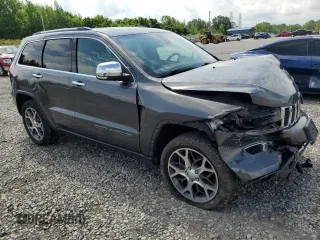 2019 Jeep Grand Cherokee Limited with VIN 1C4RJFBG7KC638930, listed as a Copart auction lot 54989895 with 103,637 mi miles and Salvage title. Bid and sale history available at DreamBid. Image 4.
