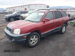 2004 Hyundai Santa Fe GLS with VIN KM8SC73DX4U640640, listed as a IAAI auction lot 41803501 with 149,924 mi miles. Bid and sale history available at carsss.com. Image 2.