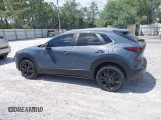 2024 Mazda CX-30 S Preferred with VIN 3MVDMBCM5RM648894, listed as a IAAI auction lot 42119860 with 23,857 mi miles and . Bid and sale history available at DreamBid. Image 14.