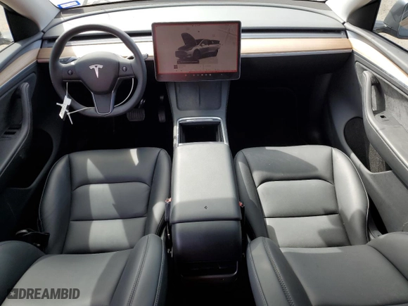 2024 Tesla Model Y with VIN 7SAYGDEDXRA327652, listed as a Copart auction lot 48930705 with 57,999 mi miles and Salvage Title. Bid and sale history available at carsss.com. Image 8.