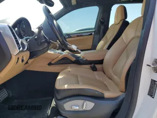 2014 Porsche Cayenne with VIN WP1AA2A28ELA09742, listed as a Copart auction lot 61779285 with 182,380 mi miles and Salvage title. Bid and sale history available at DreamBid. Image 7.