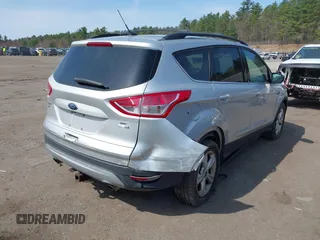2016 Ford Escape SE z VIN 1FMCU9GXXGUB78201, wystawiony jako IAAI lot #42048676 z przebiegiem 139 144 mil mil oraz . Historia ofert i sprzedaży dostępna na DreamBid. Obrazek 4.