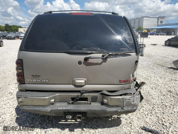 2002 GMC Yukon Denali with VIN 1GKEK63U12J154624, listed as a Copart auction lot 73827304 with 165,518 mi miles and Salvage Title. Bid and sale history available at carsss.com. Image 6.