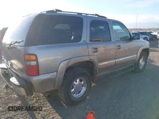 2002 GMC Yukon SLT with VIN 1GKEK13Z52J263912, listed as a IAAI auction lot 41799085 with 340,006 mi miles. Bid and sale history available at carsss.com. Image 4.