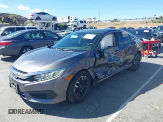 2016 Honda Civic Sedan LX with VIN 19XFC2F51GE034644, listed as a IAAI auction lot 41939884 with 59,433 mi miles. Bid and sale history available at carsss.com. Image 16.