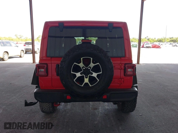 2021 Jeep Wrangler Unlimited Rubicon z VIN 1C4HJXFG8MW785318, wystawiony jako IAAI lot #42118969 z przebiegiem 61 572 mil mil oraz . Historia ofert i sprzedaży dostępna na DreamBid. Obrazek 16.